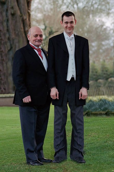 Ramon and Massey and Son funeral directors posing at a wedding