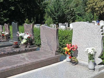 Close up of headstones over a grave
