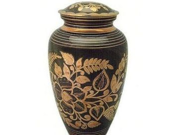 Elegant black urn with gold floral decoration 