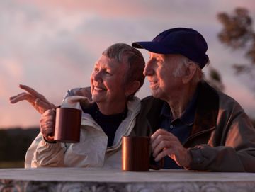 Couple after Advanced Funeral Planning looking at a sunrise